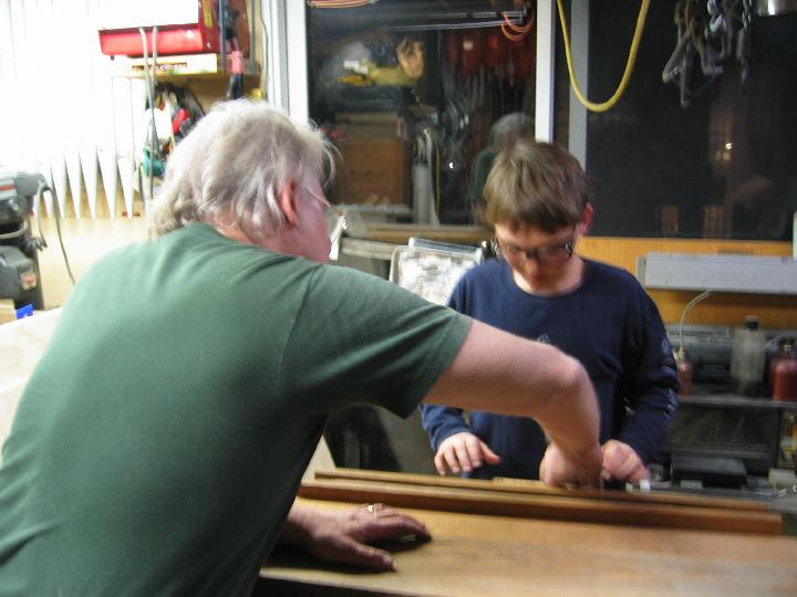 IMG_4958.jpg - My godfather, Win, showing me how to set the saw fence.