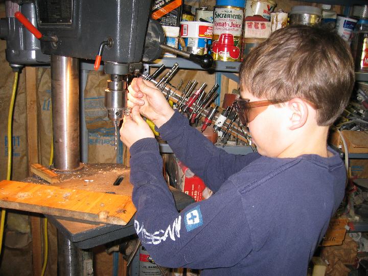 IMG_4972.jpg - Using a chuck key to change drill bits.  I needed to make two pieces of wood with four screw holes.