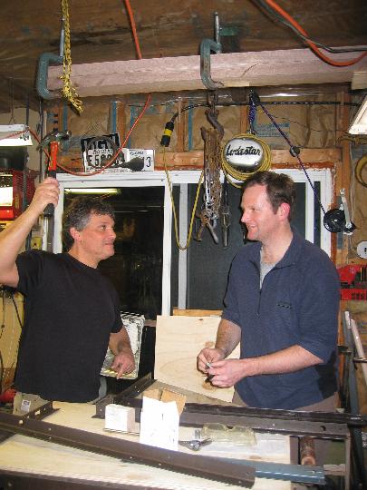 IMG_5085.jpg - My dad and Matt clowning around.  See the glued up kicking arm hanging from the ceiling?  We hung it there for days while the glue dried.